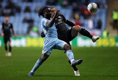 021121 - Coventry City v Swansea City - SkyBet Championship - Jake Bidwell of Swansea City is tackled by Fankaty Dabo of Coventry City