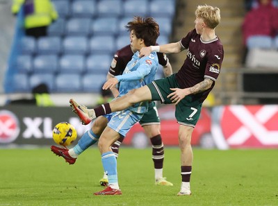 261225 - Coventry City v Swansea City - Sky Bet Championship - Melker Widell of Swansea and Tatsuhiro Sakamoto of Coventry