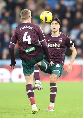 261225 - Coventry City v Swansea City - Sky Bet Championship - Jay Fulton of Swansea and Marko Stamenic of Swansea go for the same ball