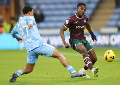 261225 - Coventry City v Swansea City - Sky Bet Championship - Zeidane Inoussa of Swansea and Milan van Ewijk of Coventry