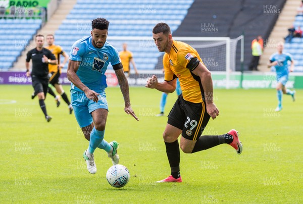 190817 - Coventry City v Newport County - Sky Bet League 2 - Newport County forward Joe Quigley on the ball tracked by Coventry City defender Jordan Willis (4)