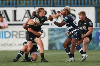 040926 - Coventry RFC v Ospreys, Pre-season Friendly - Harri Houston of Ospreys hands off Api Bavadra of Coventry