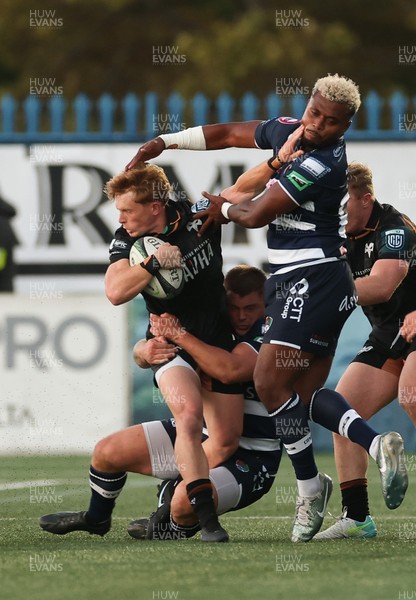 040926 - Coventry RFC v Ospreys, Pre-season Friendly - Harri Houston of Ospreys hands off Api Bavadra of Coventry