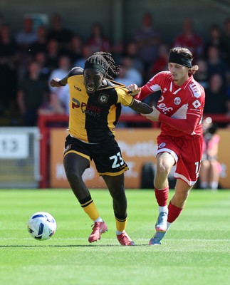 080825 - Crawley Town v Newport County, EFL Sky Bet League 2 - Michael Reindorf of Newport County and Kyle Scott of Crawley Town compete for the ball