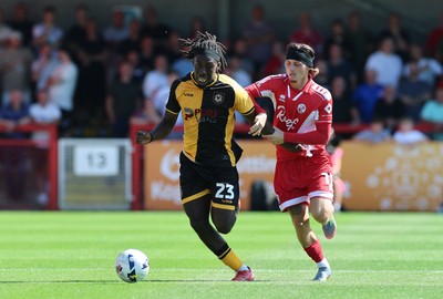 080825 - Crawley Town v Newport County, EFL Sky Bet League 2 - Michael Reindorf of Newport County and Kyle Scott of Crawley Town compete for the ball