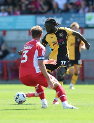 080825 - Crawley Town v Newport County, EFL Sky Bet League 2 - Cameron Antwi of Newport County takes on Dion Conroy of Crawley Town
