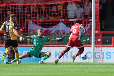 080825 - Crawley Town v Newport County, EFL Sky Bet League 2 - Kabongo Tshimanga of Crawley Town misses a chance to beat Newport County goalkeeper Nik Tzanev