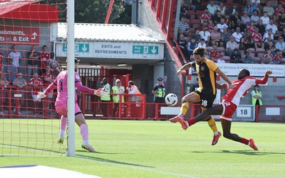 080825 - Crawley Town v Newport County, EFL Sky Bet League 2 - Liam Shephard of Newport County shoots to score the second goal