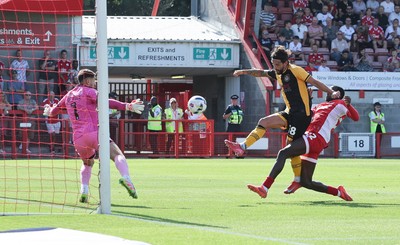 080825 - Crawley Town v Newport County, EFL Sky Bet League 2 - Liam Shephard of Newport County shoots to score the second goal