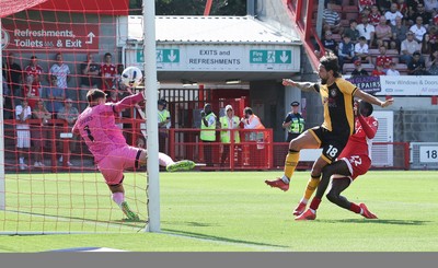 080825 - Crawley Town v Newport County, EFL Sky Bet League 2 - Liam Shephard of Newport County shoots to score the second goal