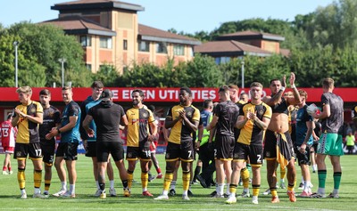 080825 - Crawley Town v Newport County, EFL Sky Bet League 2 - Newport County players applaud the fans at the end of the match