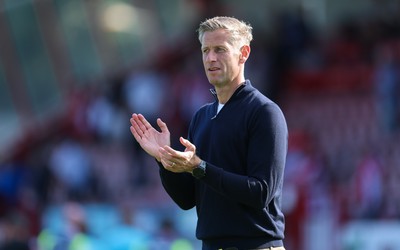 080825 - Crawley Town v Newport County, EFL Sky Bet League 2 - Newport County head coach David Hughes applauds the fans at the end of the match