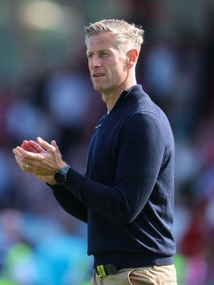 080825 - Crawley Town v Newport County, EFL Sky Bet League 2 - Newport County head coach David Hughes applauds the fans at the end of the match