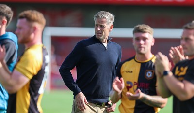080825 - Crawley Town v Newport County, EFL Sky Bet League 2 - Newport County head coach David Hughes applauds the fans at the end of the match