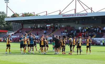 080825 - Crawley Town v Newport County, EFL Sky Bet League 2 - Newport County players applaud the fans at the end of the match