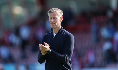 080825 - Crawley Town v Newport County, EFL Sky Bet League 2 - Newport County head coach David Hughes applauds the fans at the end of the match