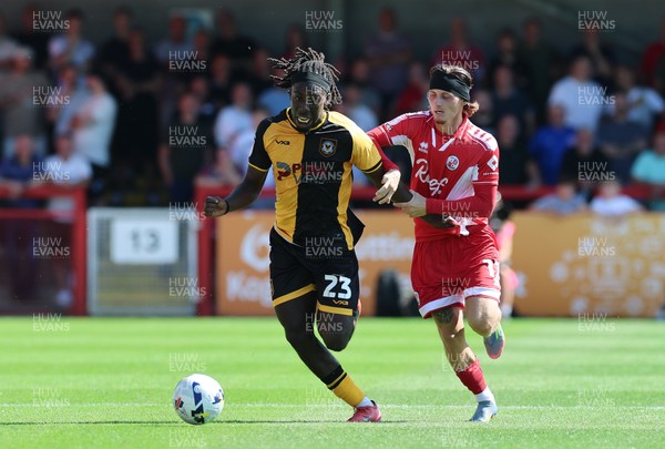 080825 - Crawley Town v Newport County, EFL Sky Bet League 2 - Michael Reindorf of Newport County and Kyle Scott of Crawley Town compete for the ball