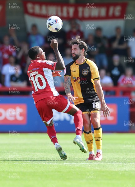 080825 - Crawley Town v Newport County, EFL Sky Bet League 2 - Reece Brown of Crawley Town and Liam Shephard of Newport County compete for the ball