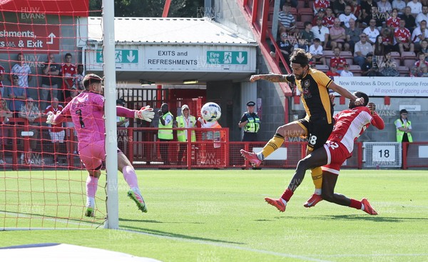 080825 - Crawley Town v Newport County, EFL Sky Bet League 2 - Liam Shephard of Newport County shoots to score the second goal