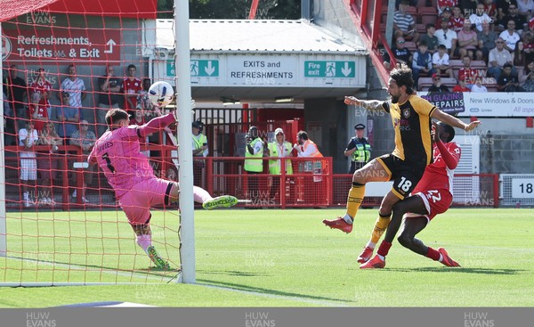 080825 - Crawley Town v Newport County, EFL Sky Bet League 2 - Liam Shephard of Newport County shoots to score the second goal