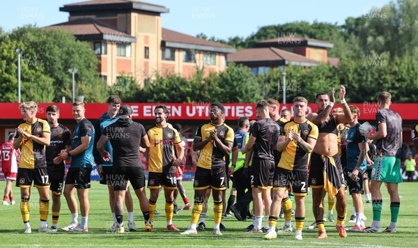 080825 - Crawley Town v Newport County, EFL Sky Bet League 2 - Newport County players applaud the fans at the end of the match
