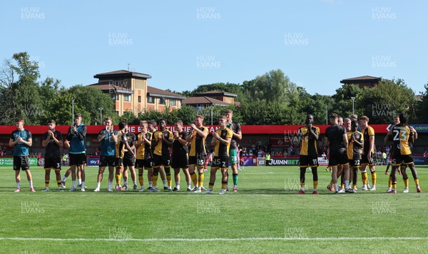 080825 - Crawley Town v Newport County, EFL Sky Bet League 2 - Newport County players applaud the fans at the end of the match