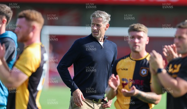 080825 - Crawley Town v Newport County, EFL Sky Bet League 2 - Newport County head coach David Hughes applauds the fans at the end of the match