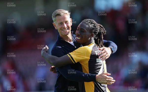080825 - Crawley Town v Newport County, EFL Sky Bet League 2 - Newport County head coach David Hughes celebrates with Michael Reindorf of Newport County at the end of the match