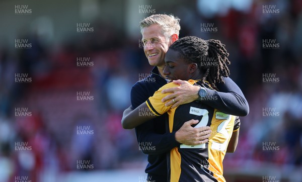 080825 - Crawley Town v Newport County, EFL Sky Bet League 2 - Newport County head coach David Hughes celebrates with Michael Reindorf of Newport County at the end of the match