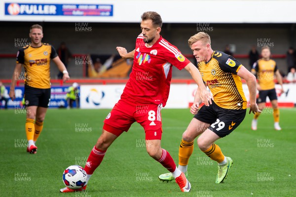 151022 - Crawley Town v Newport County - Sky Bet League 2 - Will Evans of Newport County and Jack Powell of Crawley Town battle for the ball