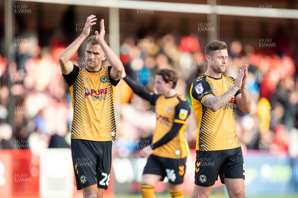 151022 - Crawley Town v Newport County - Sky Bet League 2 - Mickey Demetriou of Newport County and James Clarke of Newport County applaud the fans