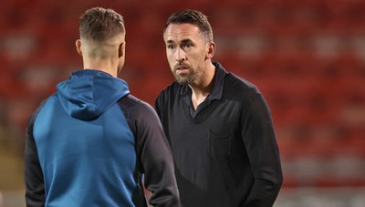 101225 - Crewe Alexandra v Newport County - Sky Bet League 2 - Newport manager Christian Fuchs talks to James Clarke of Newport before the match