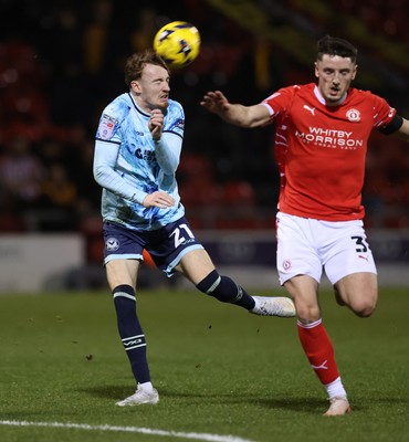 101225 - Crewe Alexandra v Newport County - Sky Bet League 2 - Michael Spellman of Newport and Reece Hutchinson of Crewe