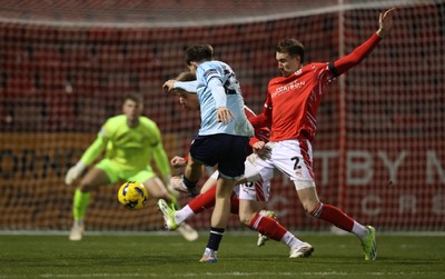 101225 - Crewe Alexandra v Newport County - Sky Bet League 2 - Ben Lloyd of Newport takes a shot on goal which rebounded for an own goal from Crewe player