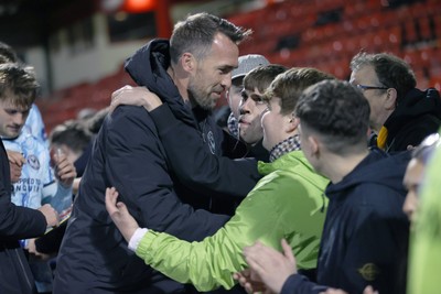 101225 - Crewe Alexandra v Newport County - Sky Bet League 2 - Fans hug Newport manager Christian Fuchs at the end of the match