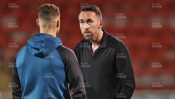 101225 - Crewe Alexandra v Newport County - Sky Bet League 2 - Newport manager Christian Fuchs talks to James Clarke of Newport before the match