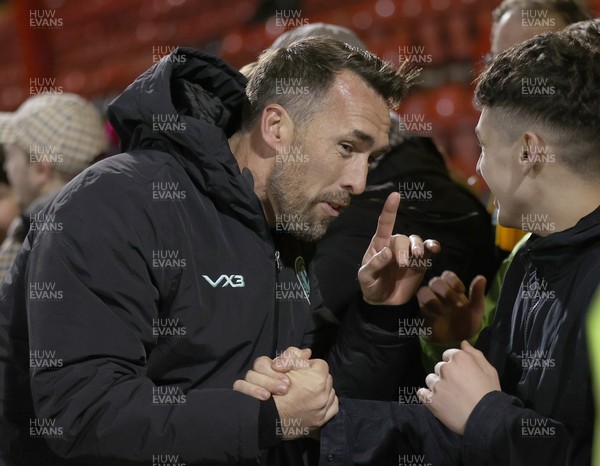 101225 - Crewe Alexandra v Newport County - Sky Bet League 2 - Fans hug Newport manager Christian Fuchs at the end of the match