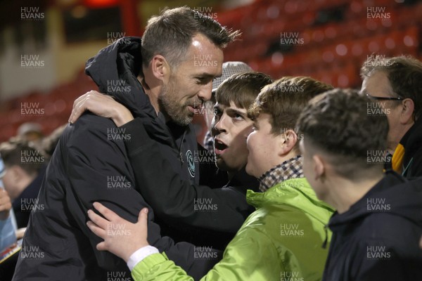 101225 - Crewe Alexandra v Newport County - Sky Bet League 2 - Fans hug Newport manager Christian Fuchs at the end of the match
