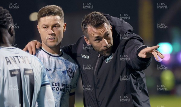 101225 - Crewe Alexandra v Newport County - Sky Bet League 2 - Newport manager Christian Fuchs and James Clarke of Newport point to fans