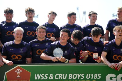 270426 - Crickhowell v Haverfordwest High - Road to Principality Finals - Boys U18s Vase - Haverfordwest players celebrate lifting the vase at full time