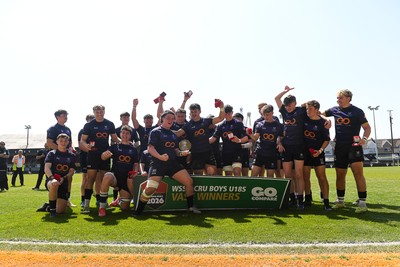 270426 - Crickhowell v Haverfordwest High - Road to Principality Finals - Boys U18s Vase - Haverfordwest players celebrate lifting the vase at full time