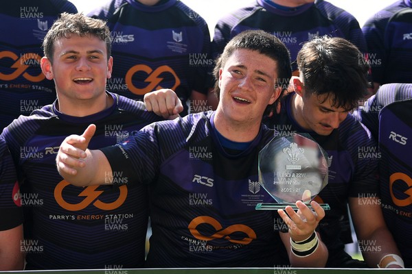 270426 - Crickhowell v Haverfordwest High - Road to Principality Finals - Boys U18s Vase - Haverfordwest players celebrate lifting the vase at full time