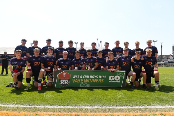 270426 - Crickhowell v Haverfordwest High - Road to Principality Finals - Boys U18s Vase - Haverfordwest players celebrate lifting the vase at full time