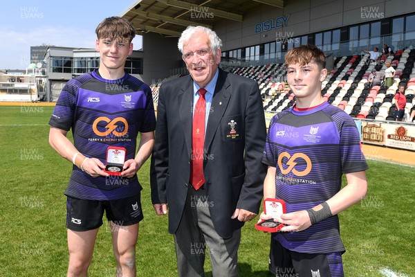 270426 - Crickhowell v Haverfordwest High - Road to Principality Finals - Boys U18s Vase - Haverfordwest players celebrate lifting the vase at full time
