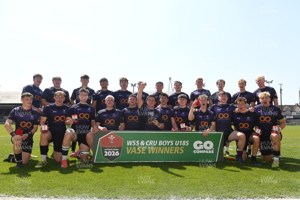 270426 - Crickhowell v Haverfordwest High - Road to Principality Finals - Boys U18s Vase - Haverfordwest players celebrate lifting the vase at full time