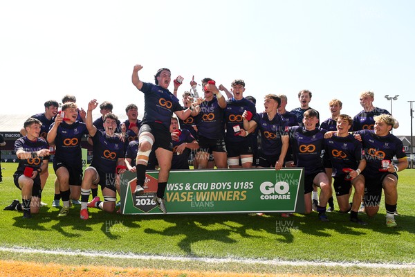 270426 - Crickhowell v Haverfordwest High - Road to Principality Finals - Boys U18s Vase - Haverfordwest players celebrate lifting the vase at full time