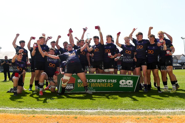 270426 - Crickhowell v Haverfordwest High - Road to Principality Finals - Boys U18s Vase - Haverfordwest players celebrate lifting the vase at full time