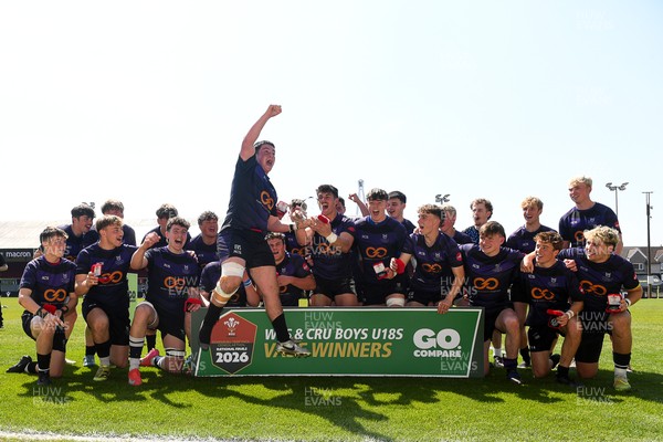 270426 - Crickhowell v Haverfordwest High - Road to Principality Finals - Boys U18s Vase - Haverfordwest players celebrate lifting the vase at full time