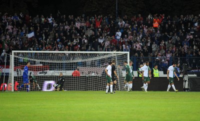 061012 - Croatia v Wales - World Cup QualifierWales' playes look dejected after Mario Mandzukic scores Croatia's first goal of the evening 
