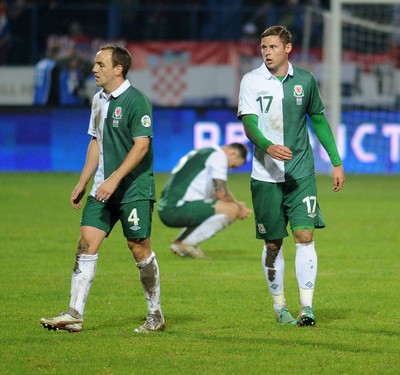 061012 - Croatia v Wales - World Cup QualifierWales' David Vaughan and Simon Church show signs of dejection after the game 